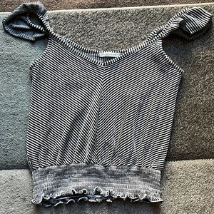 Detailed ribbed tank top. Black and white stripped.